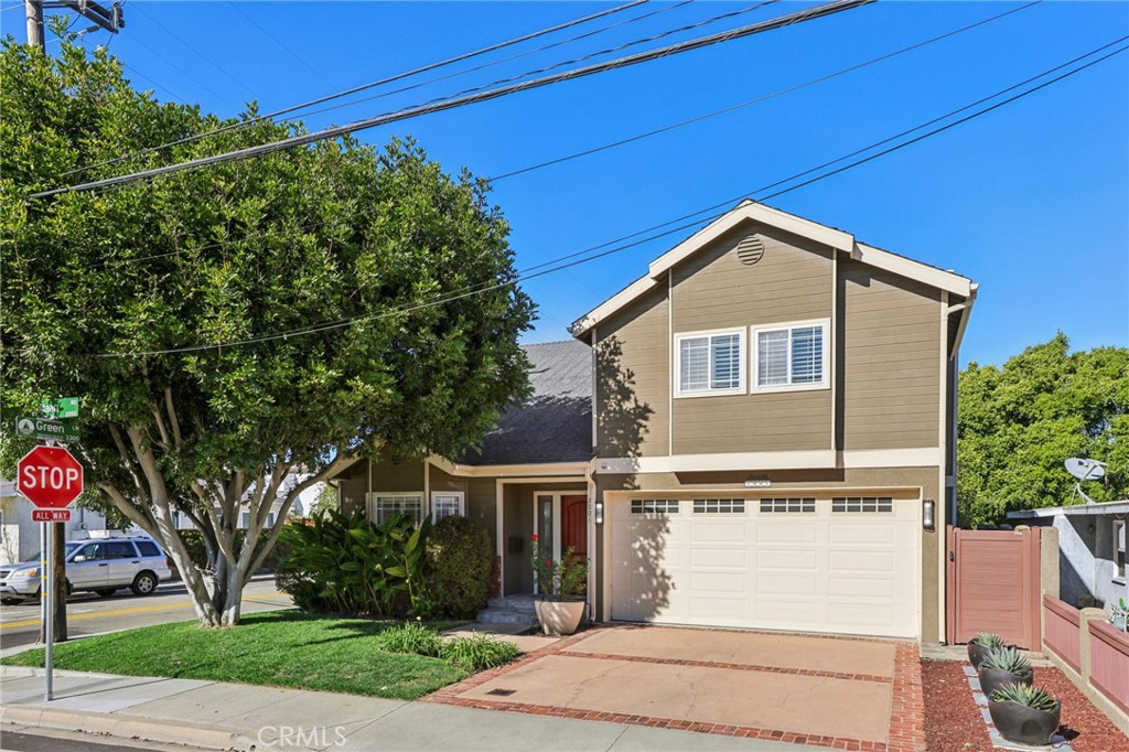 2001 Bataan Road Redondo Beach, CA 90278 - Photo 53 of 56 a front view of a house with a yard and garage