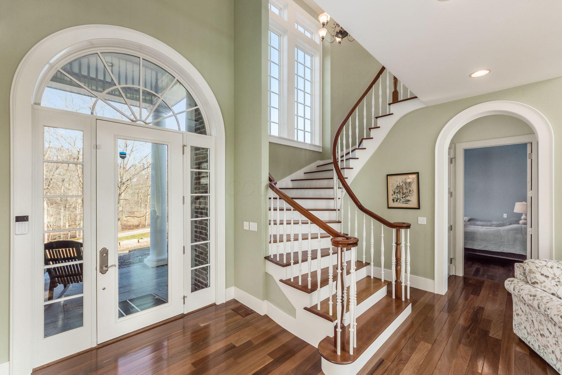 16187 Kreashbaum Road Rockbridge, OH 43149 - Photo 18 of 66 Bridal staircase and hardwood floors.