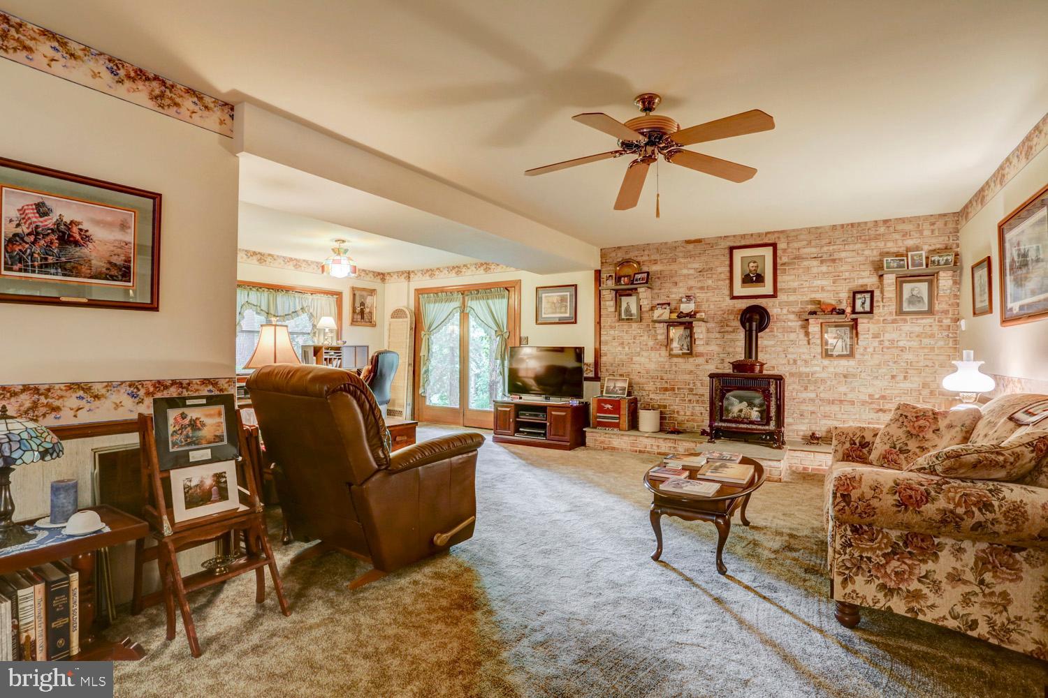 222 Witmer Road Reinholds, PA 17569 - Photo 22 of 74 Full Lower Level Family Room with propane stove