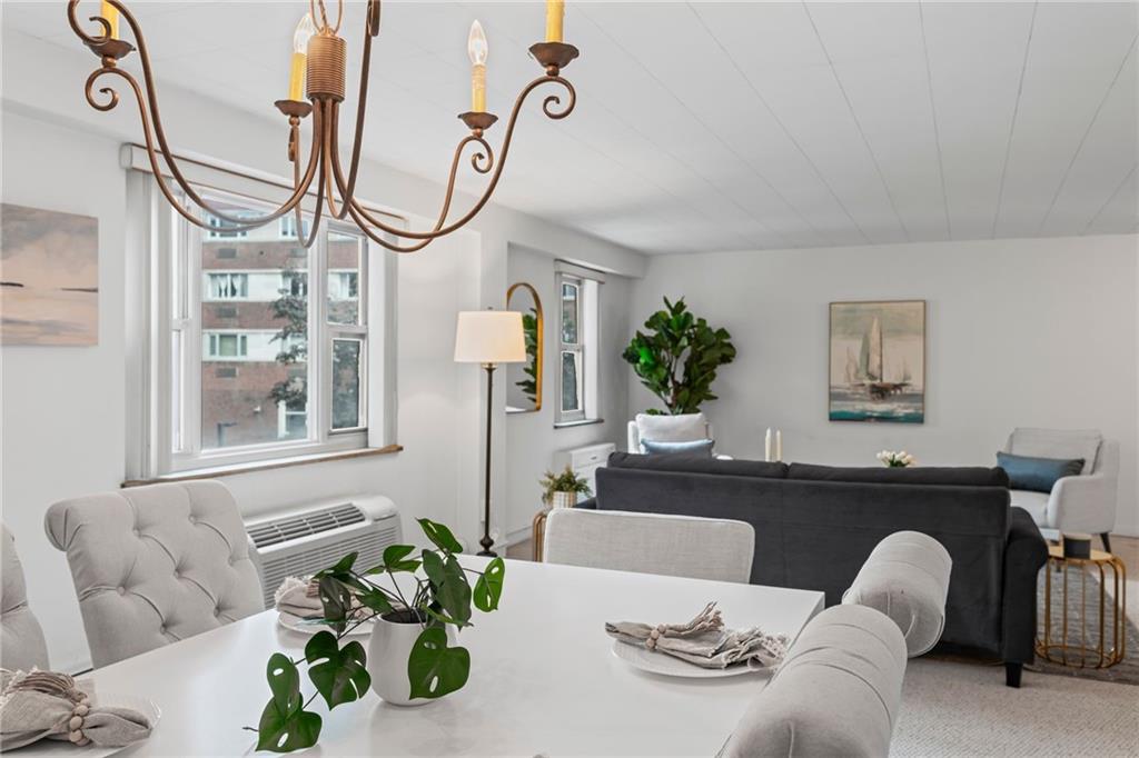 4601 Fifth Avenue, Unit 226 Pittsburgh, PA 15213 - Photo 15 of 34 a living room with furniture and white walls