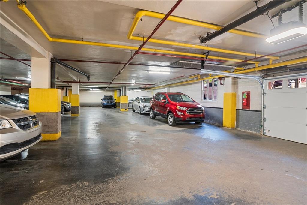 4601 Fifth Avenue, Unit 226 Pittsburgh, PA 15213 - Photo 31 of 34 a view of parking garage with cars parked