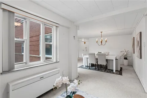 a room with furniture and a window