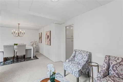 a view of a livingroom with furniture