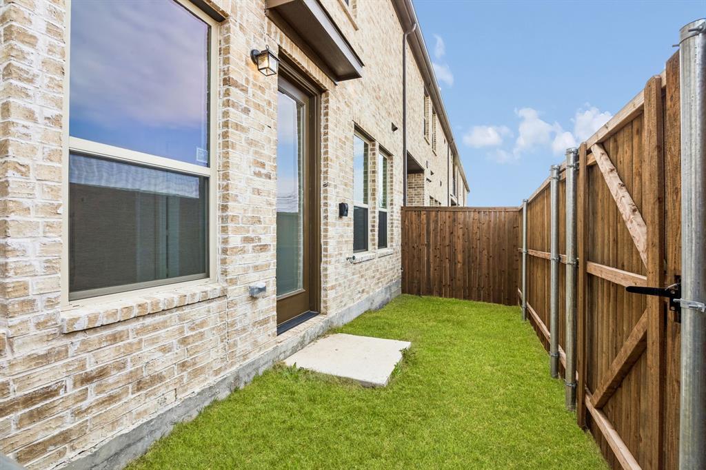 912 Heart Reef Road Plano, TX 75075 - Photo 15 of 20 a view of an entrance gate of the house