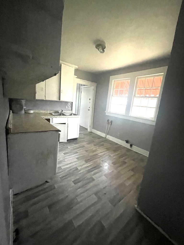 310 Bragg Smith Street Columbus, GA 31903 - Photo 3 of 6 a room with a stove and a window