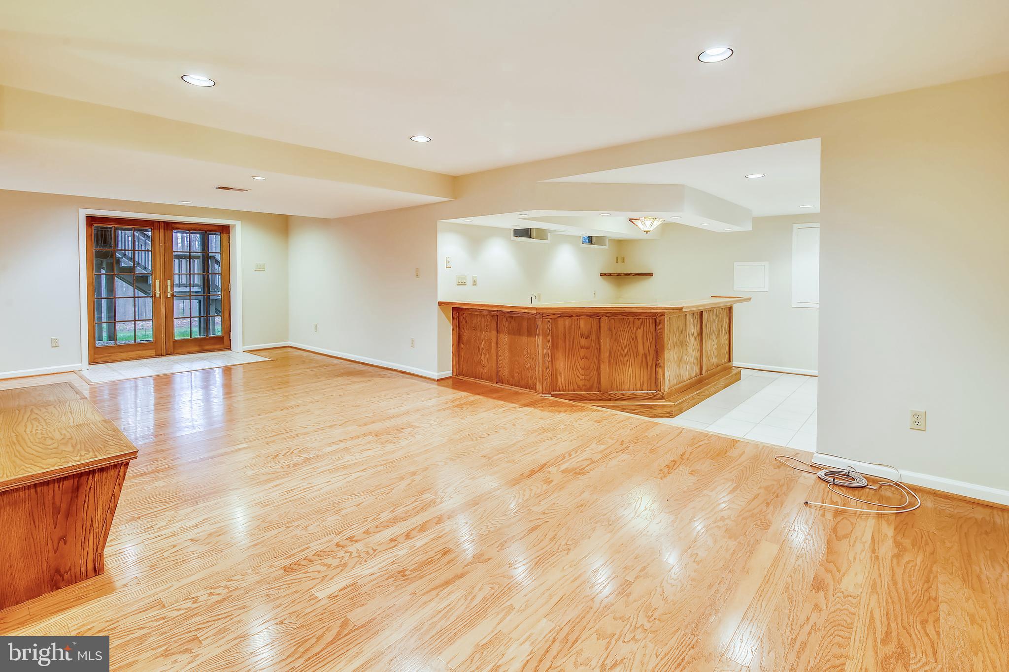 6441 Stream Valley Way Gaithersburg, MD 20882 - Photo 47 of 60 Finished Lower Level w/hardwoods
