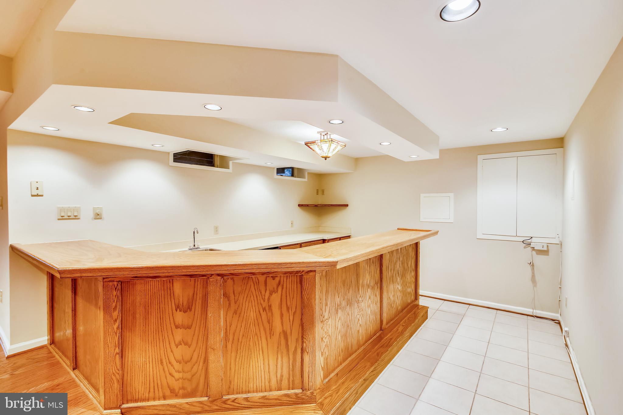 6441 Stream Valley Way Gaithersburg, MD 20882 - Photo 48 of 60 Lower Level Wet Bar