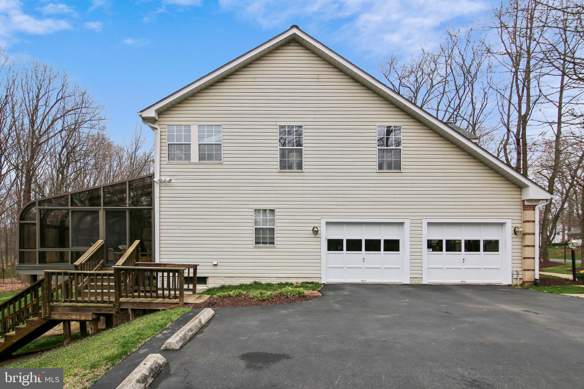 6441 Stream Valley Way Gaithersburg, MD 20882 - Photo 59 of 60 2-Car Garage and Driveway