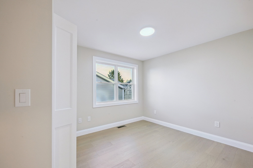 122 Stowe Street, Unit 122 Fall River, MA 02720 - Photo 11 of 21 an empty room with a window