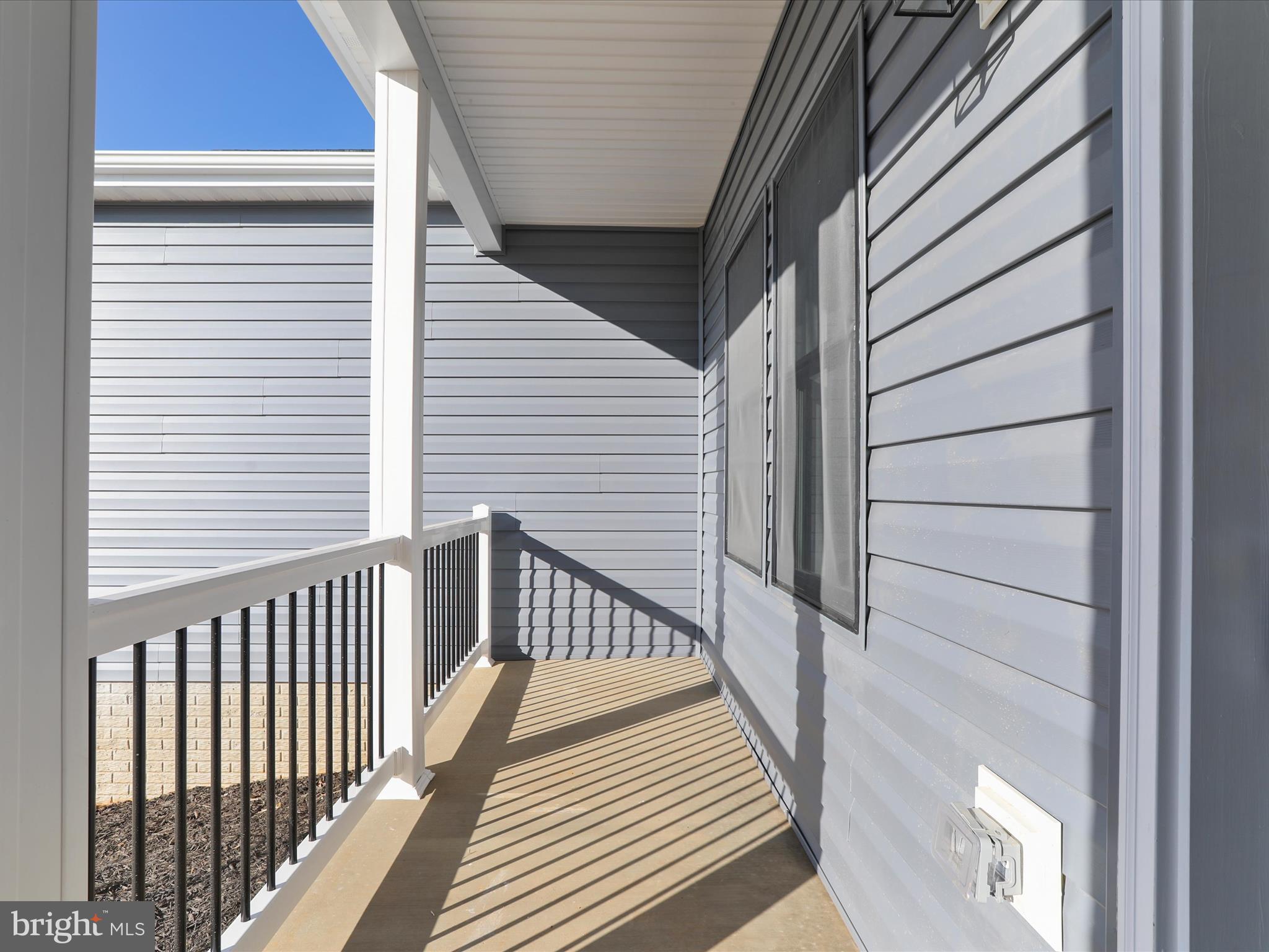 117 East 7th Avenue Ranson, WV 25438 - Photo 29 of 29 a view of a balcony with wooden floor