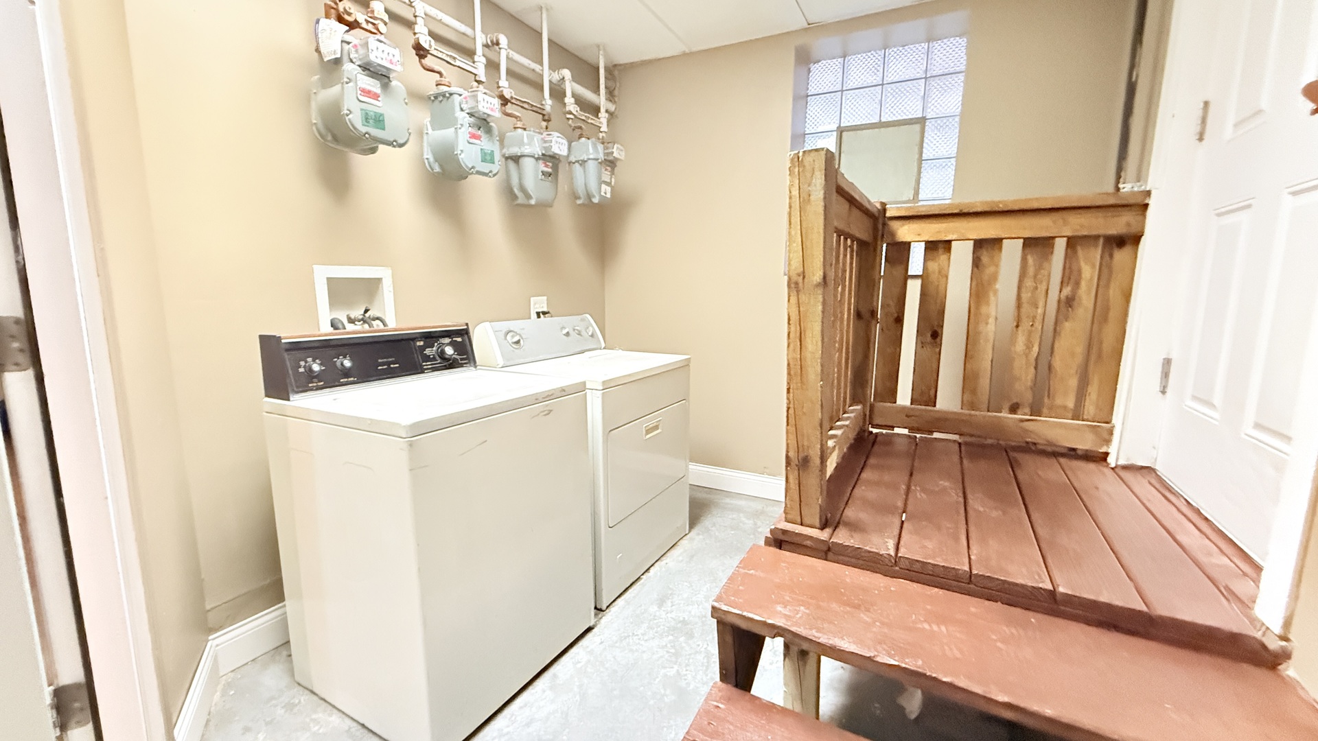 8017 South Phillips Avenue, Unit G Chicago, IL 60617 - Photo 16 of 16 a utility room with dryer and washer