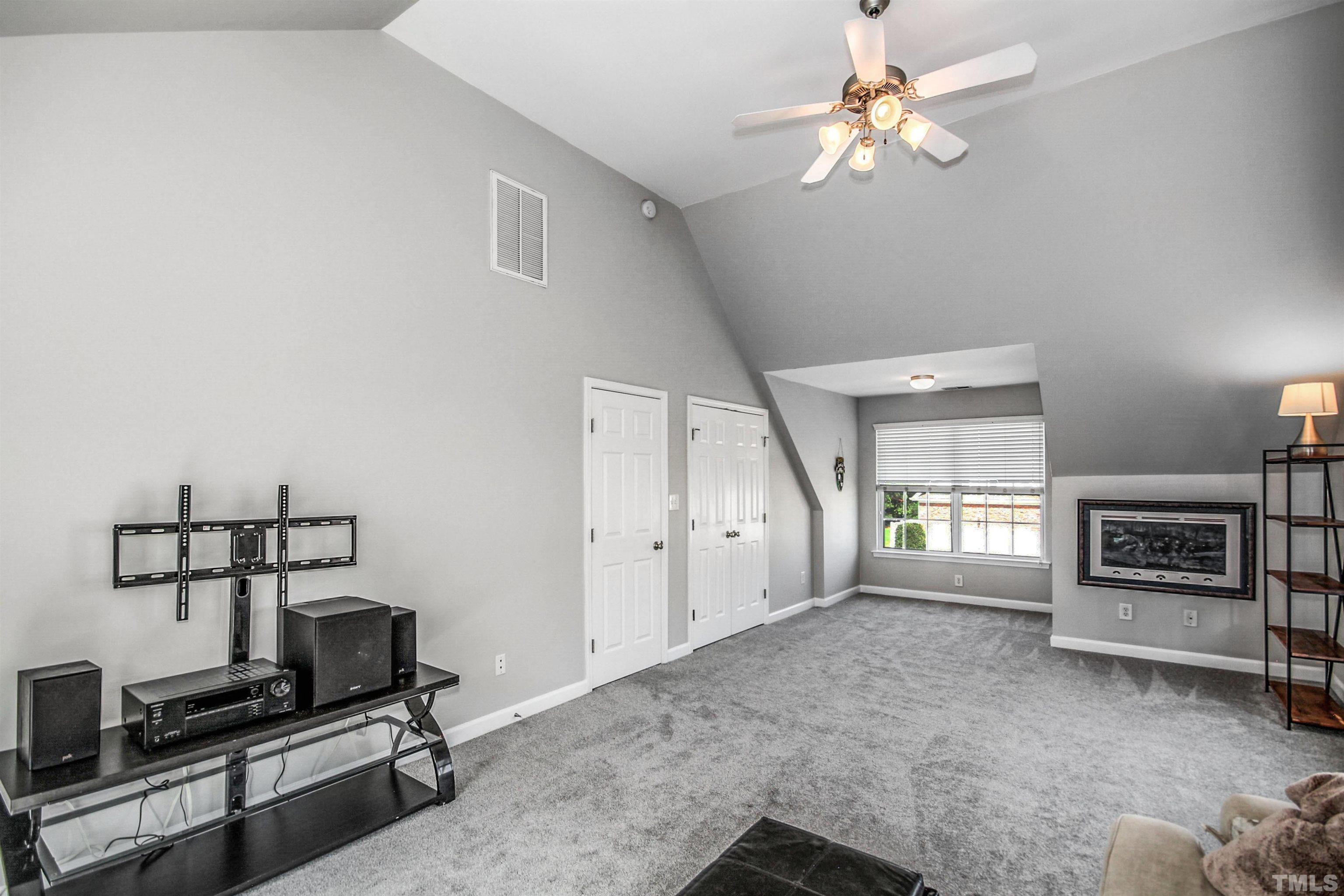 2218 Flowing Drive Raleigh, NC 27610 - Photo 21 of 27 a living room with furniture and a fireplace