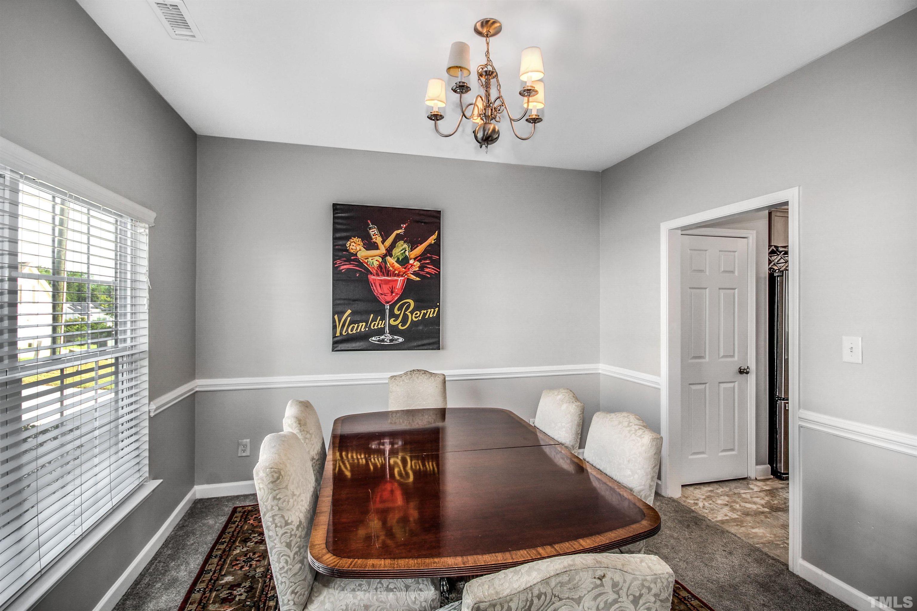 2218 Flowing Drive Raleigh, NC 27610 - Photo 6 of 27 a living room with furniture