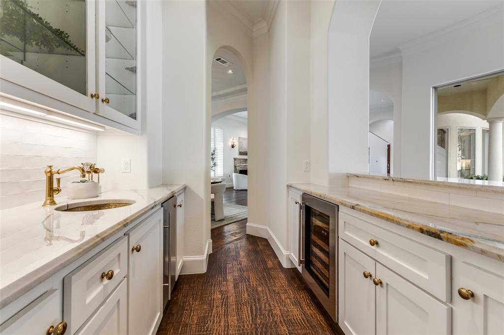 14828 Bellbrook Drive Addison, TX 75254 - Photo 13 of 36 a spacious bathroom with a granite countertop double vanity sink a mirror and a shower