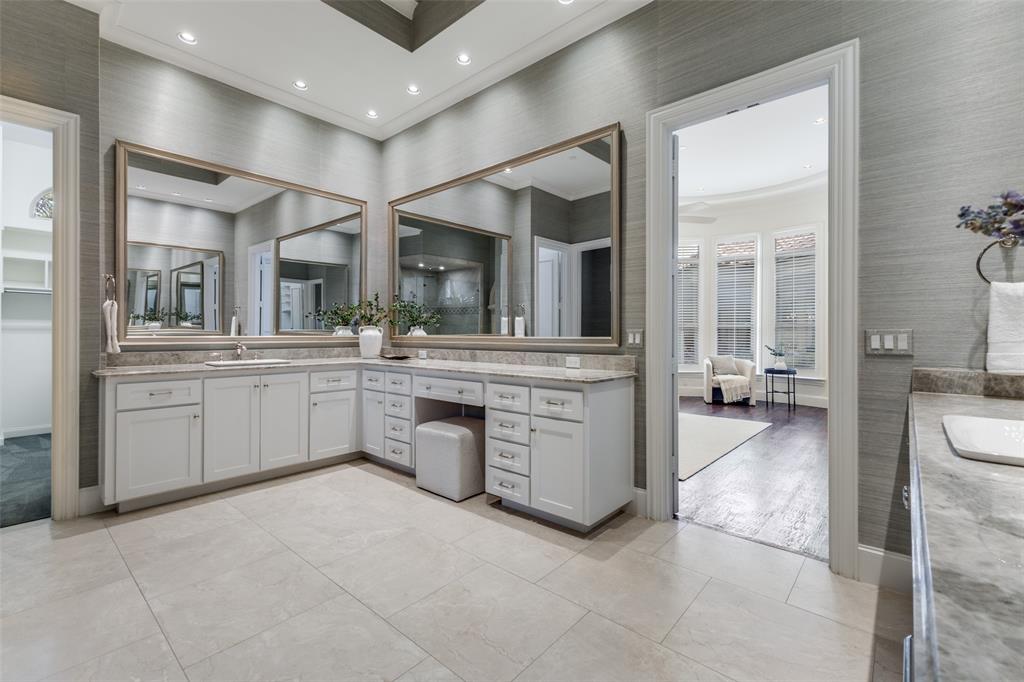 14828 Bellbrook Drive Addison, TX 75254 - Photo 23 of 36 a large white kitchen with a large window