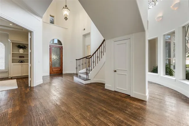 a view of entryway with wooden floor