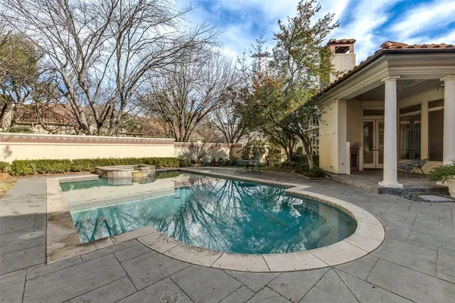 a view of a house with a swimming pool