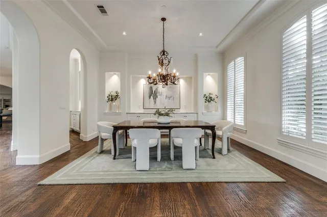 a view of a dining room with furniture and window
