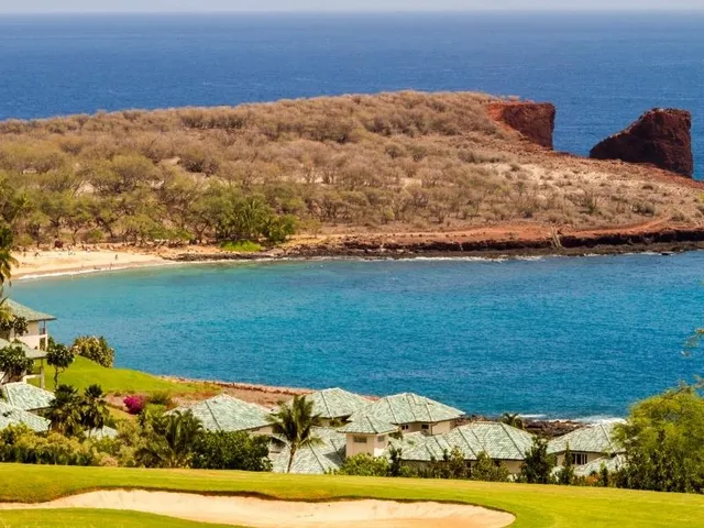 a view of an ocean and city
