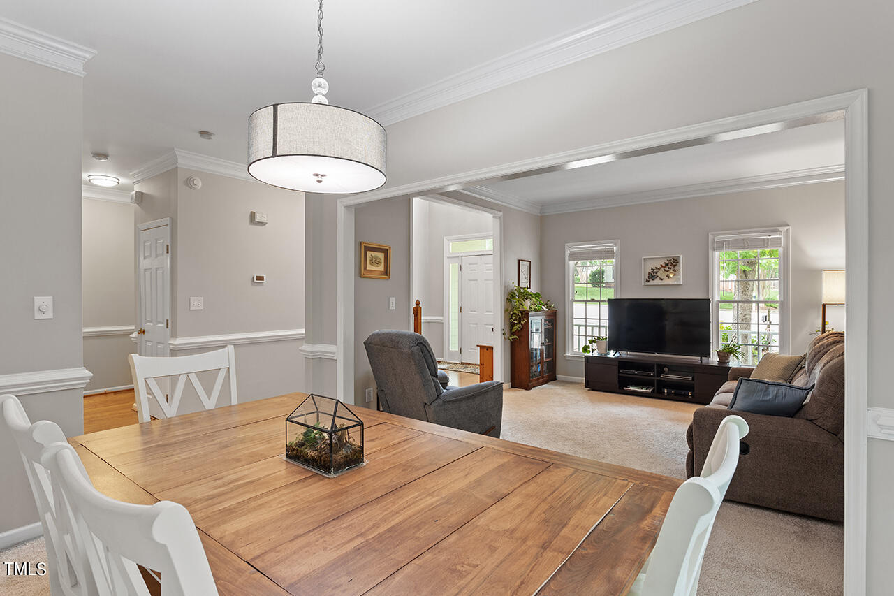 2604 Clerestory Place Raleigh, NC 27615 - Photo 18 of 37 a view of a dining room with furniture