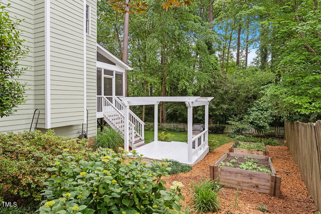 2604 Clerestory Place Raleigh, NC 27615 - Photo 4 of 37 a view of a house with backyard and sitting area