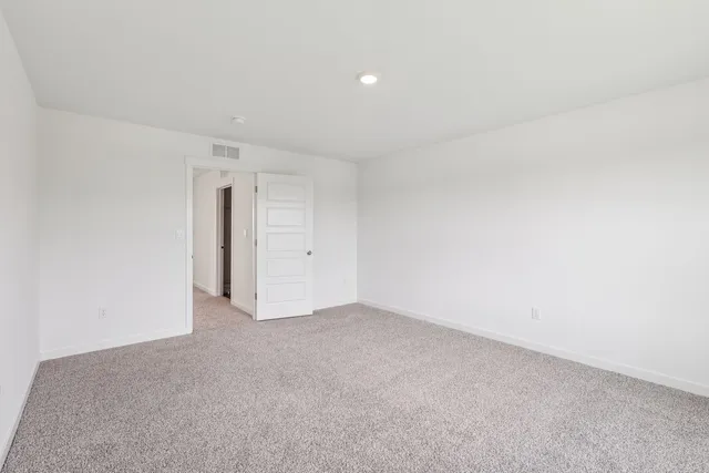 a bathroom with a double vanity sink and mirror