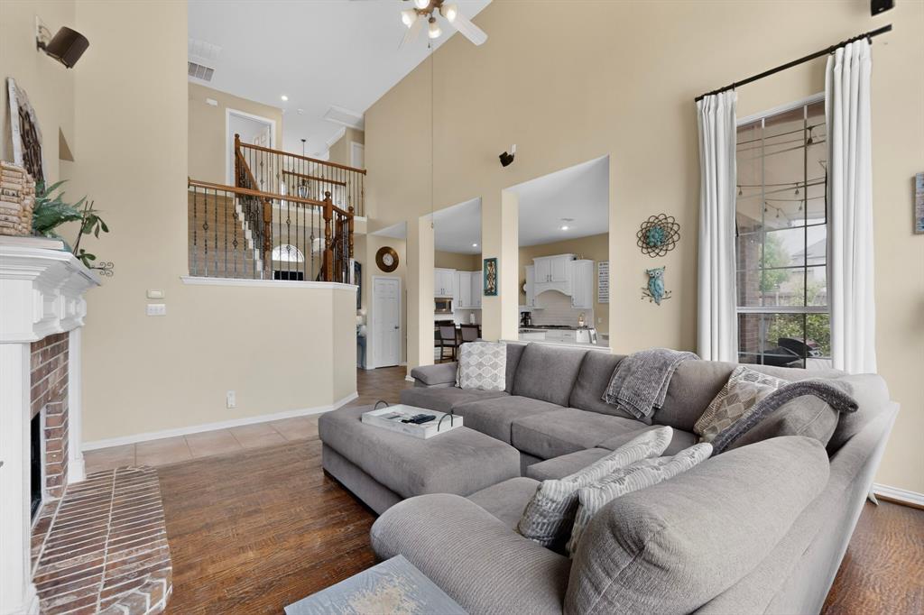 4004 White Porch Road Plano, TX 75024 - Photo 11 of 40 a living room with furniture and a large window