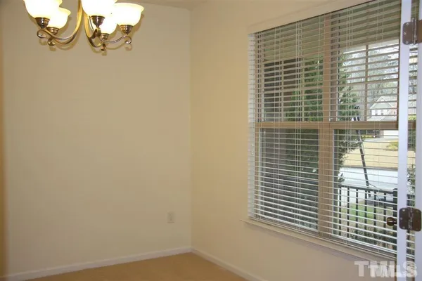 a view of a window and an empty room