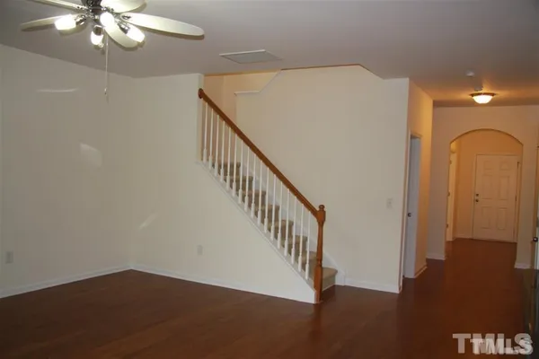 a view of a livingroom with wooden floor