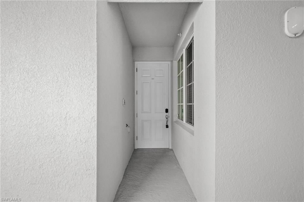 43997 Boardwalk Loop, Unit 1837 Babcock Ranch, FL 33982 - Photo 23 of 26 a view of a hallway