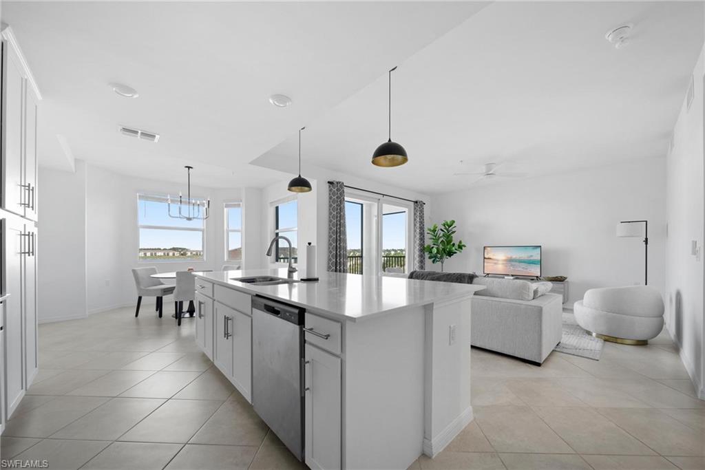 43997 Boardwalk Loop, Unit 1837 Babcock Ranch, FL 33982 - Photo 8 of 26 a very nice looking dining room with a large window
