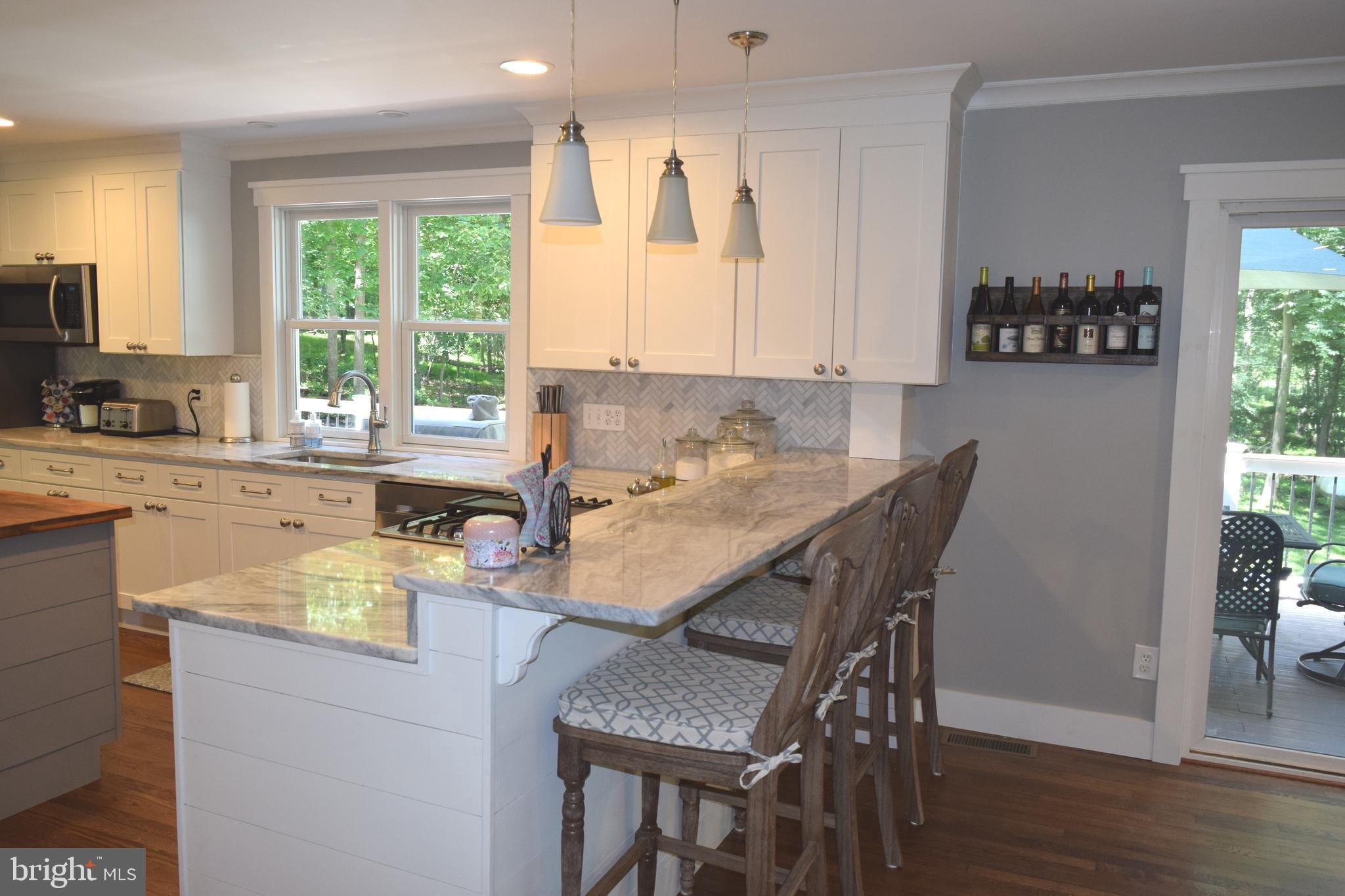 3590 Daisy Road Woodbine, MD 21797 - Photo 15 of 55 Counter space eating and pendant lighting