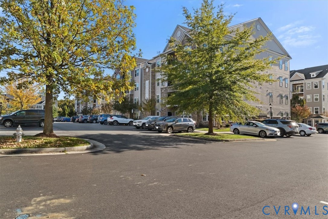 14011 Briars Circle, Unit 104 Midlothian, VA 23114 - Photo 21 of 22 a view of a street with houses