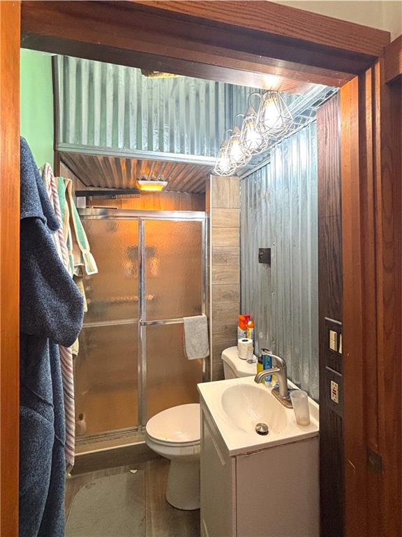 4217 Hillsville Road Pulaski, PA 16143 - Photo 19 of 26 a bathroom with a sink a toilet and shower