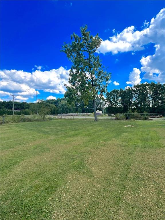 4217 Hillsville Road Pulaski, PA 16143 - Photo 8 of 26 a view of a yard with a house