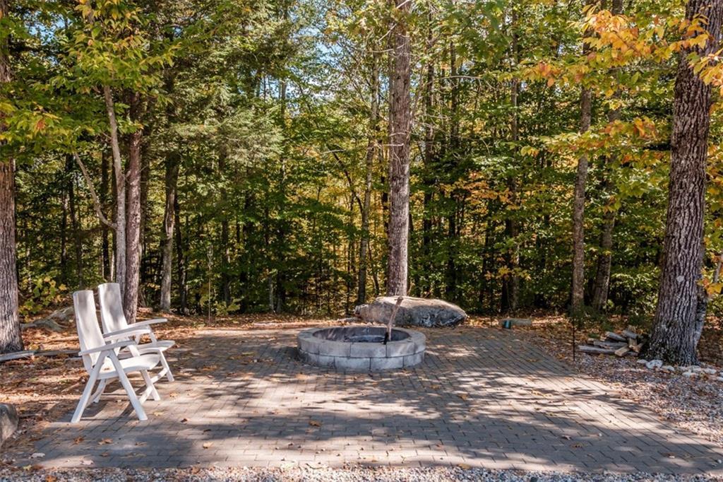 450 West Lovell Road Lovell, ME 04051 - Photo 34 of 35 Bricked patio with fire pit in the...