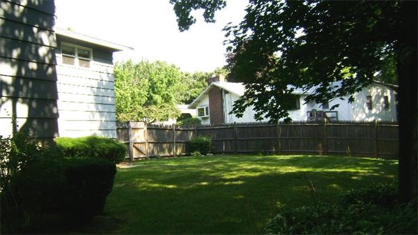 172 Damon Road Needham, MA 02494 - Photo 14 of 14 a view of a backyard with a garden