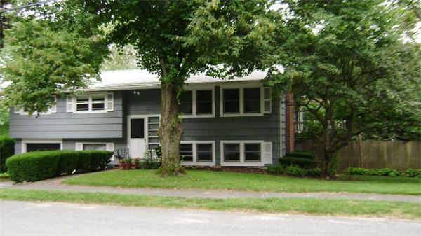 172 Damon Road Needham, MA 02494 - Photo 2 of 14 a front view of a house with a garden