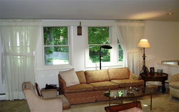 172 Damon Road Needham, MA 02494 - Photo 4 of 14 a living room with furniture and a large window