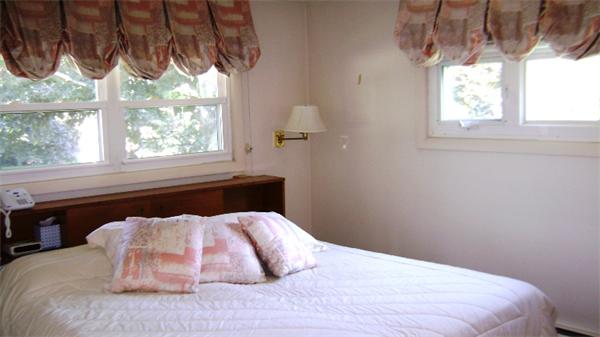 172 Damon Road Needham, MA 02494 - Photo 7 of 14 a bedroom with a bed and a window