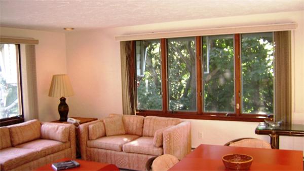 172 Damon Road Needham, MA 02494 - Photo 9 of 14 a living room with furniture and a large window