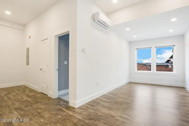 a view of livingroom with hardwood floor and window