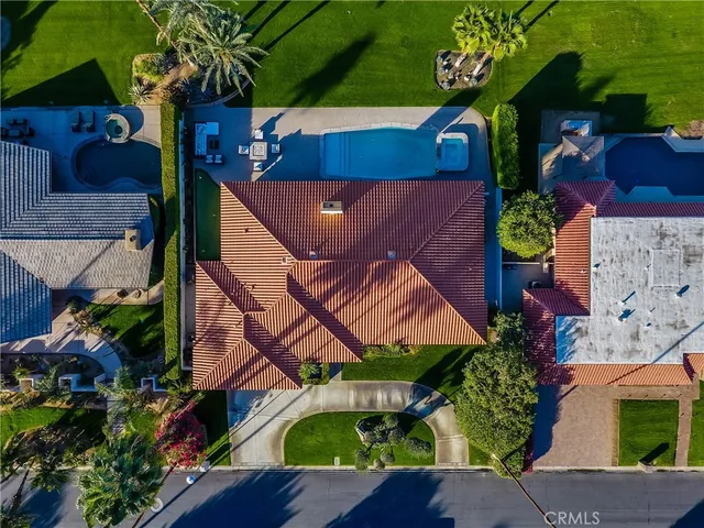 a bathroom with a tub and a large window