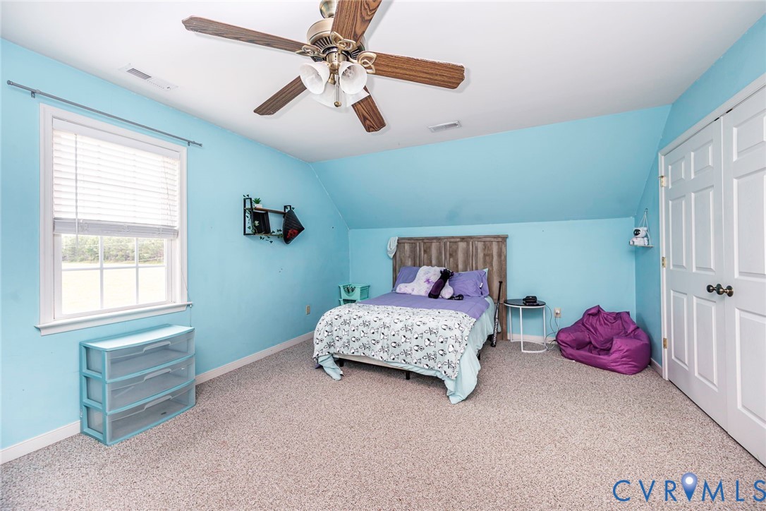 827 Sutherland Road Church Road, VA 23833 - Photo 26 of 51 Spacious room featuring carpeting, a white-framed