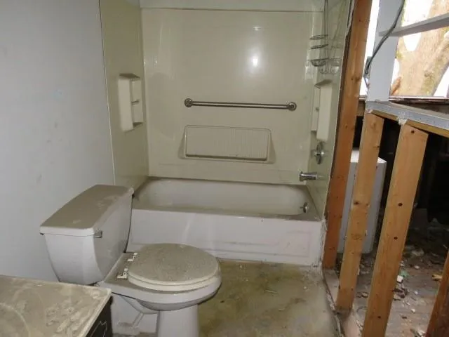 a bathroom with a sink and a toilet