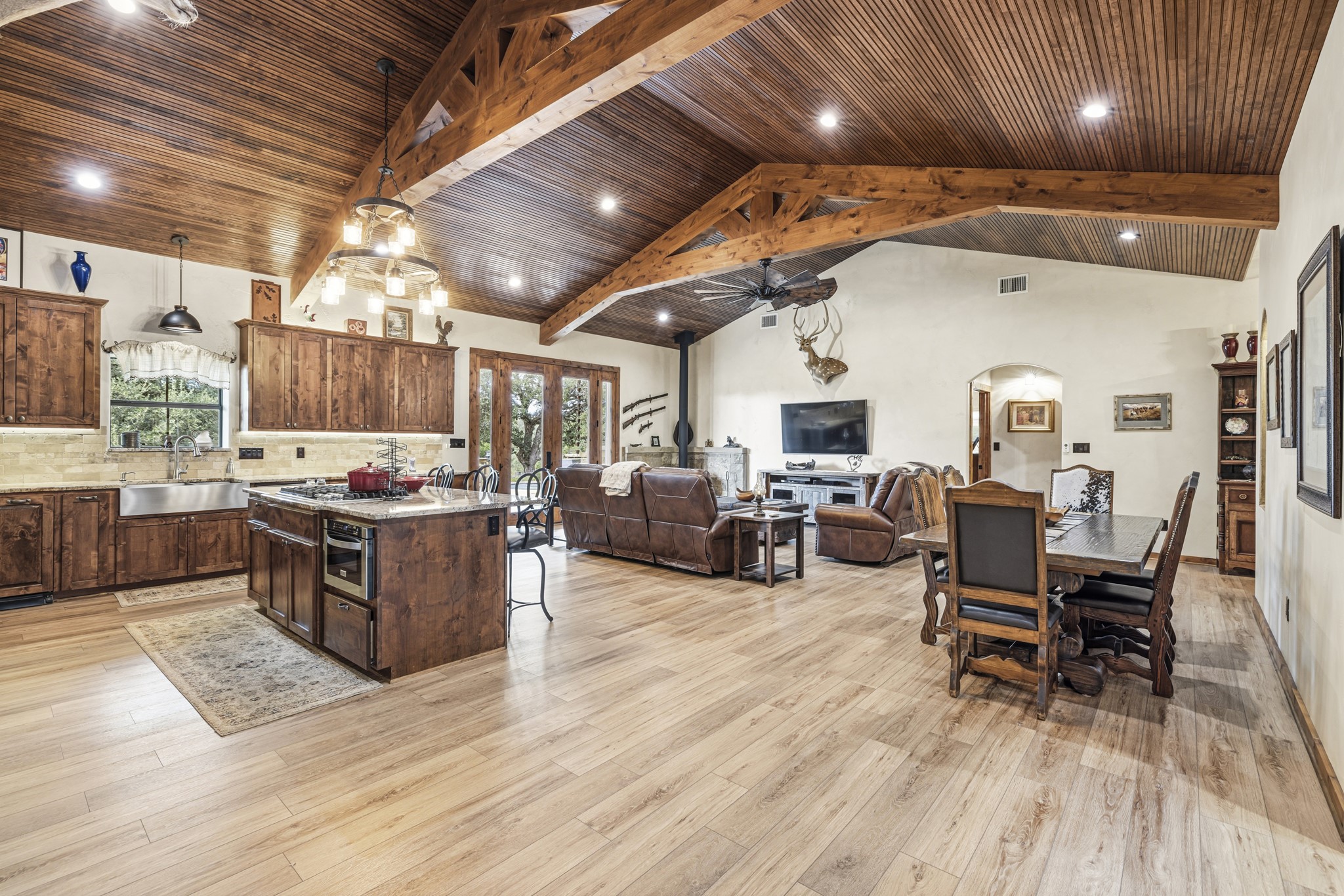 3724 Ranch Road 3347 Round Mountain, TX 78663 - Photo 5 of 40 a large room with lots of wooden furniture and a wooden floors