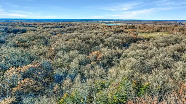 a view of water with a mountain view