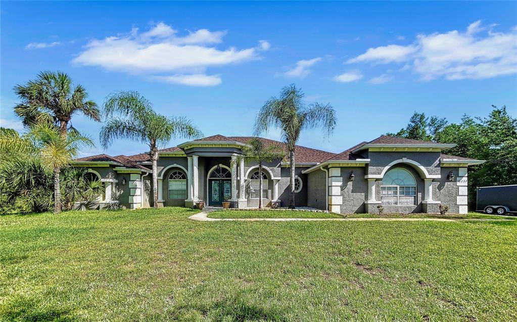 10237 Noddy Tern Road Weeki Wachee, FL 34613 - Photo 1 of 1 Large Front yard