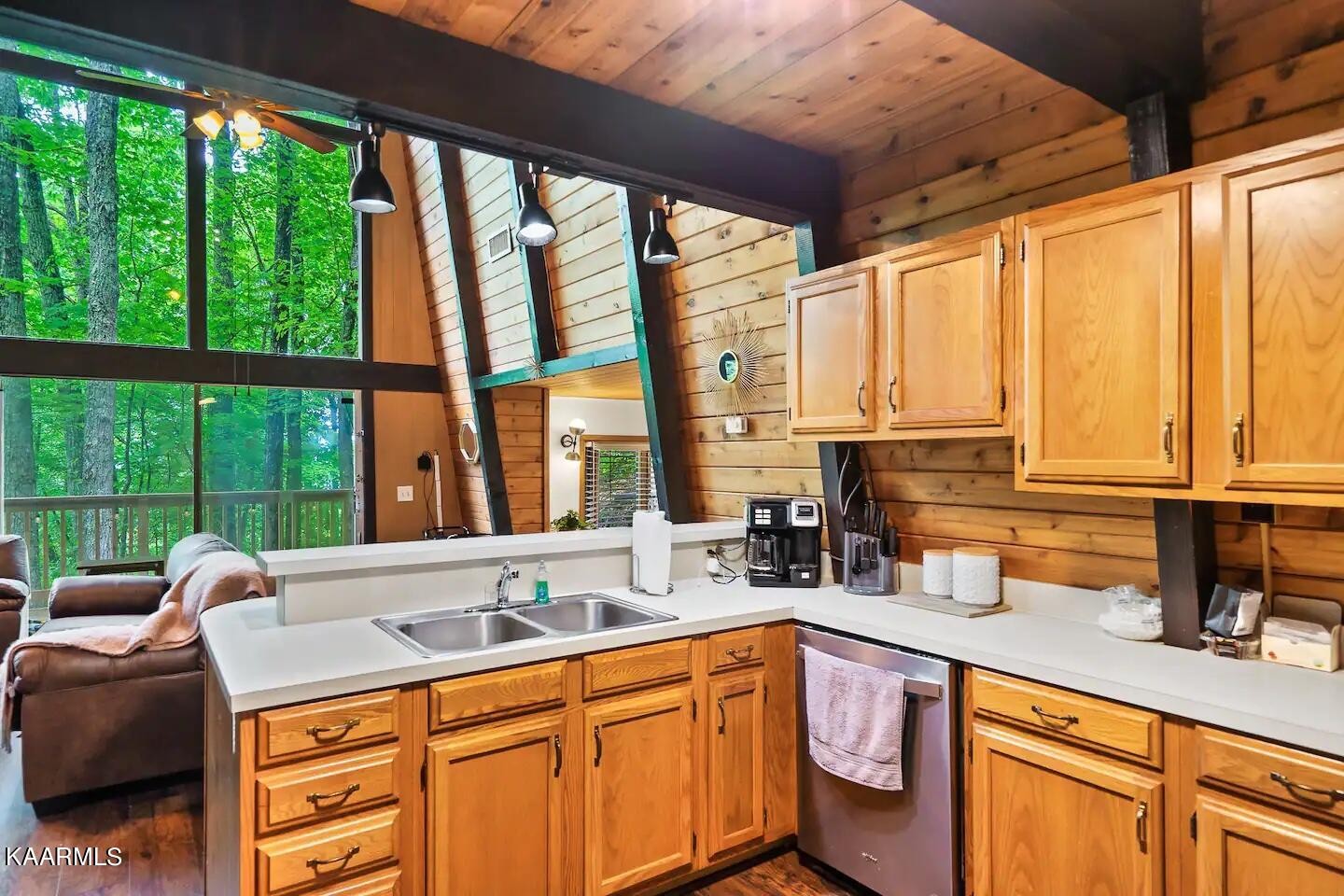 1424 Zurich Road Gatlinburg, TN 37738 - Photo 9 of 27 a kitchen with sink a large window and cabinets