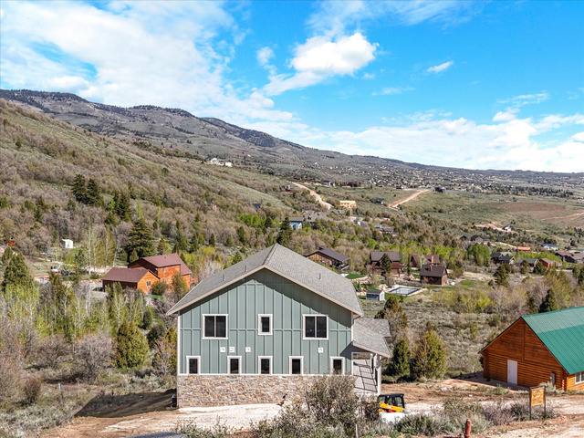 1159 North Broad Hollow Road Garden City, UT 84028 - Photo 25 of 55 Multi-story residence featuring light green siding and a stone foundation